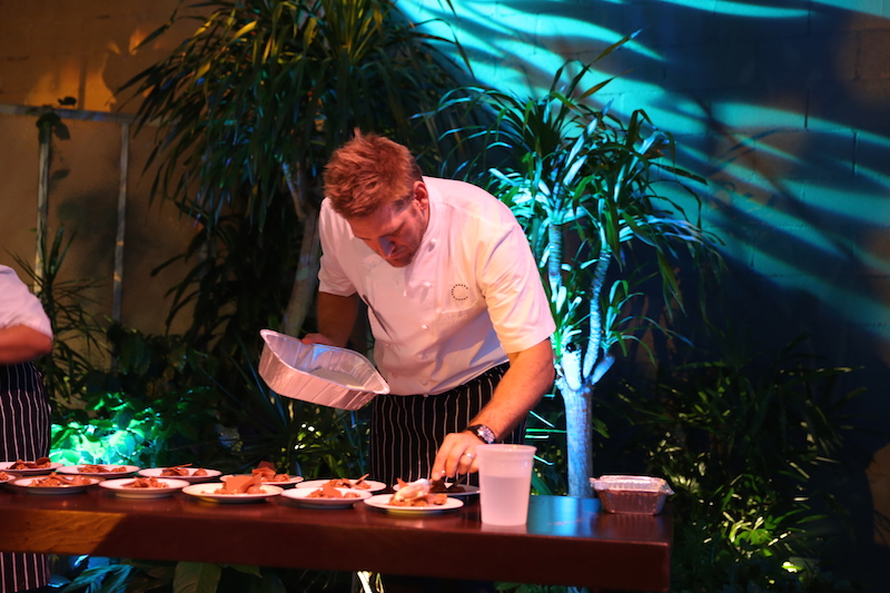 Chef Curtis Stone Plating Desserts for SHARE Guests