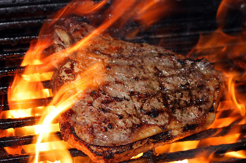 Grilling Steak over Kingsford Charcoal