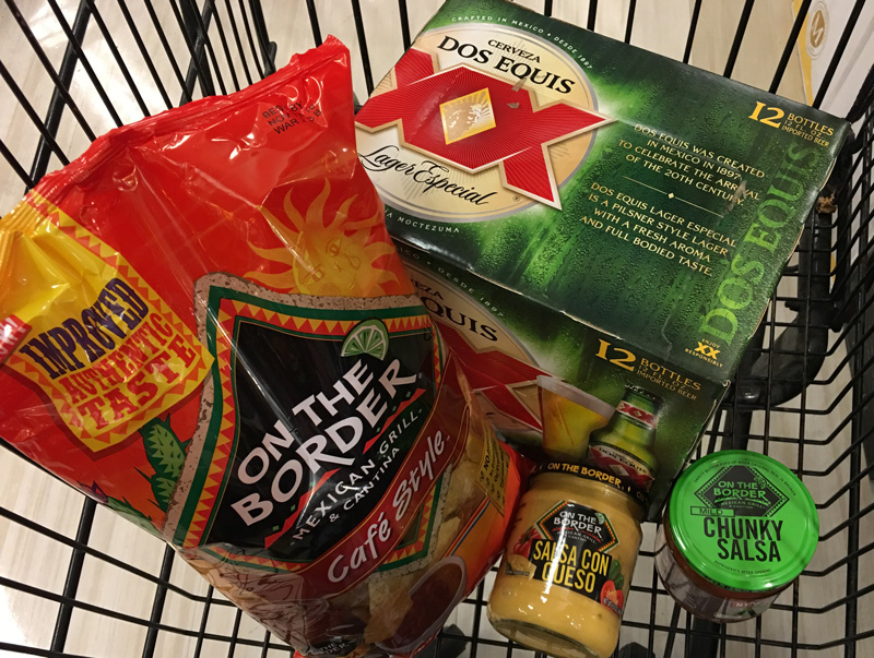 Grocery Cart Filled with Dos Equis and On the Border